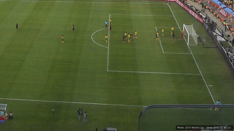 CAF Champions League 2026/27: Groups, Dates and Orlando Pirates' Fixtures Players on the green pitch at FNB Stadium in Johannesburg, seen from high in the stands during a match
